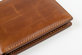 Luxury Long Wallet in Bronze, vintage utility leather macro close-up