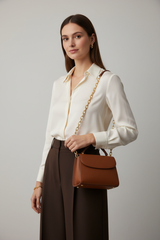 Chain Strap Mini Bag in Burnt Walnut Brown – Female Model