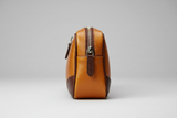 Signature Utility Pouch in Gold and Brown, side angle view