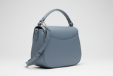 Soft Curve Shoulder Bag in Dusty Blue, side angle view