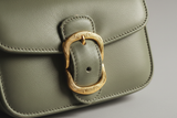 Vintage Mini Flap Bag in Dusty Sage, gold buckle and leather close-up