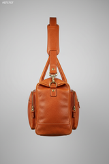 Urban Voyage Weekender in Orange Heritage Travel Leather — side angle strap
