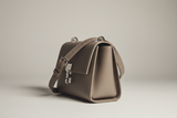 Sculpted Designer Shoulder Bag in Stone Grey, side angle view