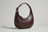 Curved Mini Shoulder Bag in Chocolate Truffle, side angle view