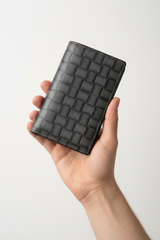 Hand holding Premium Leather Wallet in Checkered