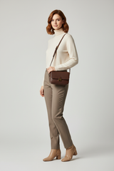 Female model wearing Everyday Mini Crossbody in Deep Cocoa