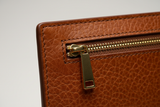 Minimal Luxury Pouch in Brown, leather and zipper macro close-up