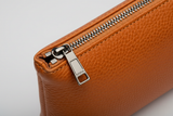 Premium Leather Utility Pouch in Orange, soft Palmellato leather macro close-up
