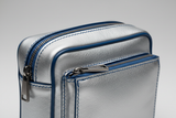 Signature Utility Pouch in Silver and Blue, structured leather macro close-up