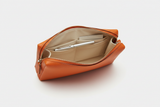 Premium Leather Utility Pouch in Orange, open zipper compartment view