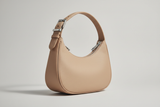 Soft Curve Shoulder Bag in Soft Beige, side angle view