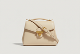Sculpted Designer Shoulder Bag in Cream Beige, front view