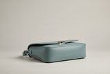 Soft Matte Shoulder Bag in Dusty Aqua, side angle view