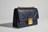 Sculpted Designer Shoulder Bag in Midnight Navy, sculpted leather and hardware close-up