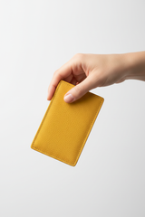 Hand holding Minimal Card Wallet in Yellow