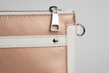Signature Utility Pouch in Rose Gold and White, heritage leather macro close-up