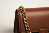 Elegant Chain Shoulder Bag in Rich Cocoa, gold chain and leather close-up