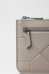 Minimal Luxe Pouch in Geometric and Silver, portrait grain leather macro close-up