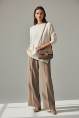 Female model carrying Contemporary Flap Shoulder Bag in Ash Mocha