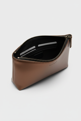 Minimal Luxe Pouch in Bronze and Black, portrait open zipper compartment view