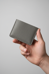 Hand holding Minimal Card Wallet in Gray
