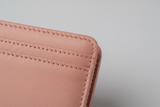 Luxury Long Wallet in Pink, premium soft leather macro close-up