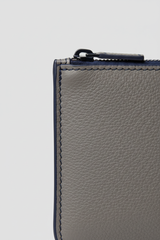 Minimal Luxe Pouch in Gray and Navy, portrait leather and zipper macro close-up