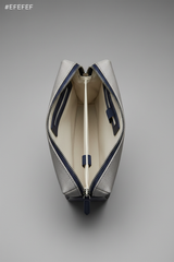 Minimal Luxe Pouch in Gray and Navy, portrait open zipper compartment view