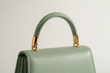 Luxury Mini Shoulder Bag in Pistachio Green, top handle and hardware close-up
